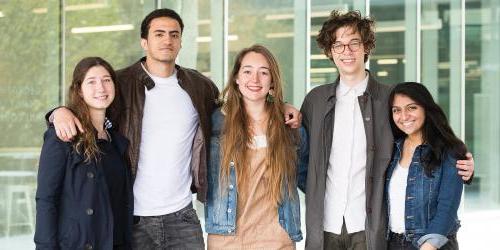 Current undergraduate students standing together as a group