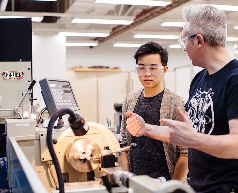 Machine Shop students working at lathe