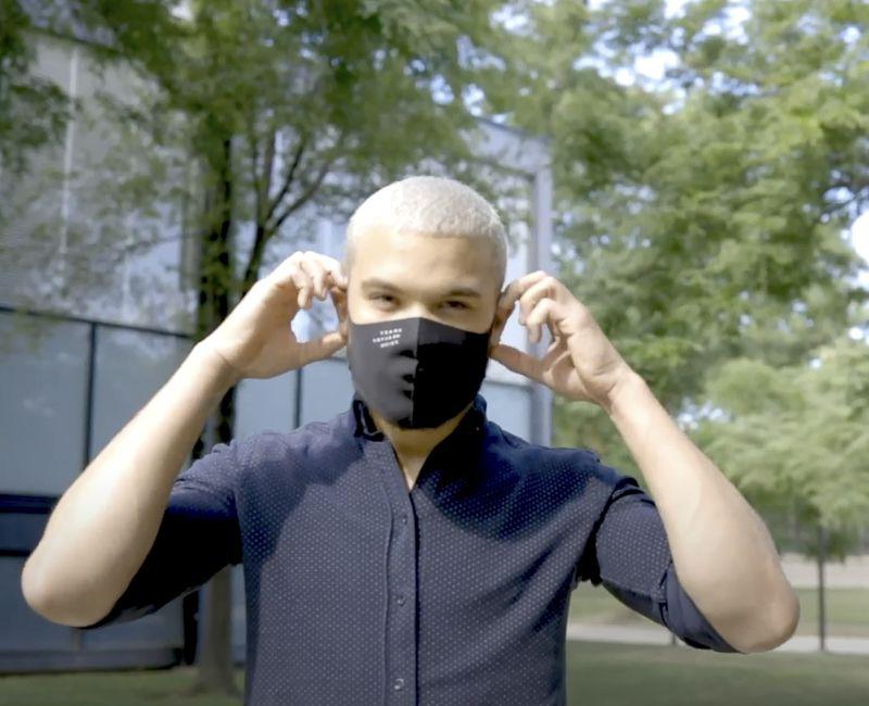 Student wearing a face covering mask